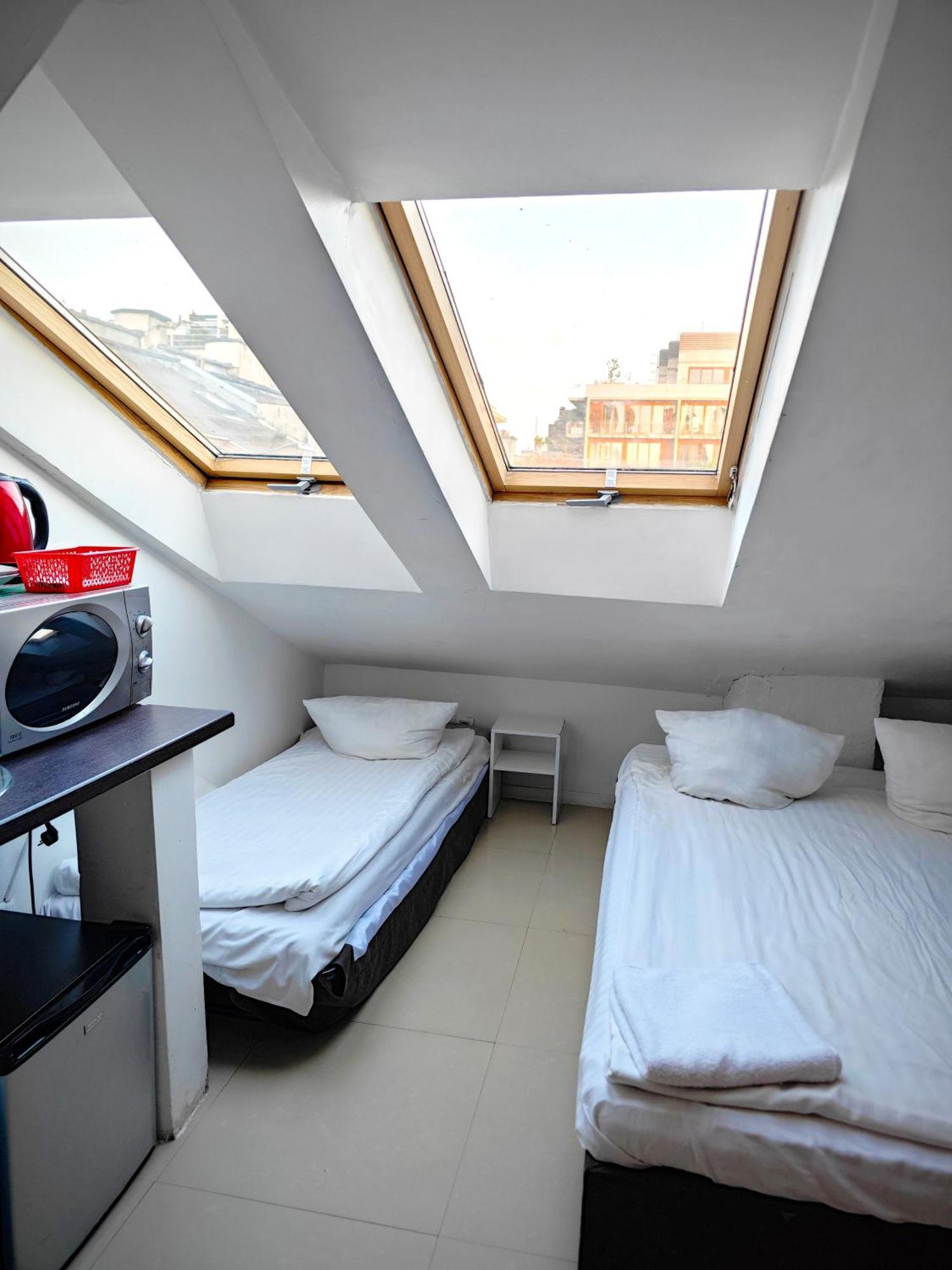 Apartamenty Hoza Attic Studio Varşova Oda fotoğraf